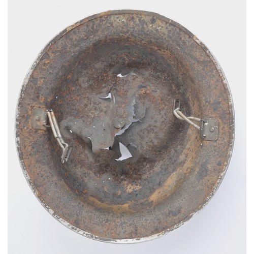 117 - Battle Damaged British MkII Helmet. Reputedly recovered in Holland , MkII combat shell with extensiv... 