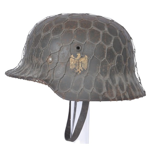 169 - WW2 German Chickenwire Camouflage Single Decal Army M40 Helmet. German M40 combat helmet with full b... 