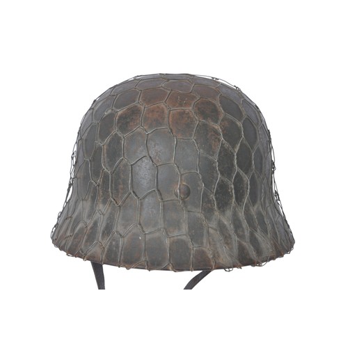 169 - WW2 German Chickenwire Camouflage Single Decal Army M40 Helmet. German M40 combat helmet with full b... 