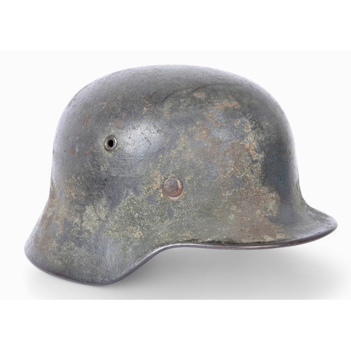 170 - WW2 German M40 Luftwaffe Camouflage Helmet Named 'Reinbold'. . A heavily worn German M40 three colou... 