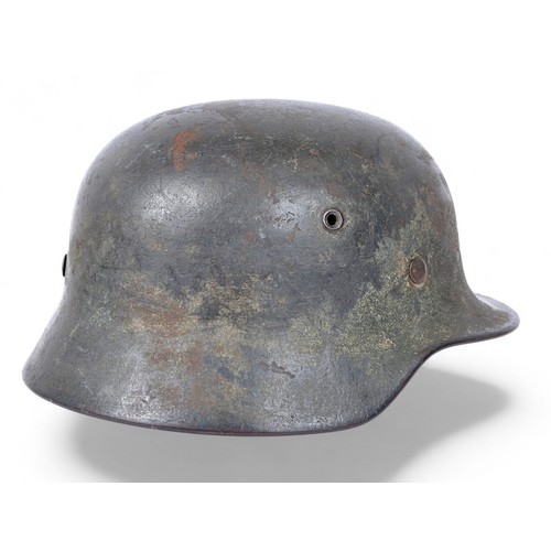 170 - WW2 German M40 Luftwaffe Camouflage Helmet Named 'Reinbold'. . A heavily worn German M40 three colou... 
