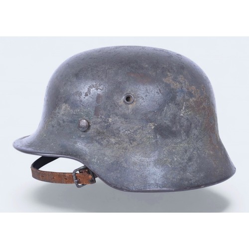 170 - WW2 German M40 Luftwaffe Camouflage Helmet Named 'Reinbold'. . A heavily worn German M40 three colou... 