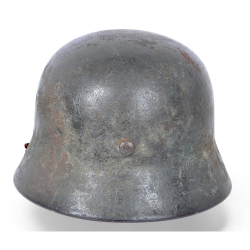 170 - WW2 German M40 Luftwaffe Camouflage Helmet Named 'Reinbold'. . A heavily worn German M40 three colou... 