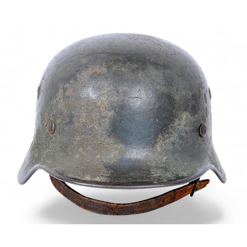 170 - WW2 German M40 Luftwaffe Camouflage Helmet Named 'Reinbold'. . A heavily worn German M40 three colou... 