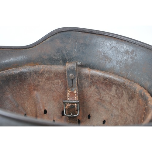170 - WW2 German M40 Luftwaffe Camouflage Helmet Named 'Reinbold'. . A heavily worn German M40 three colou... 