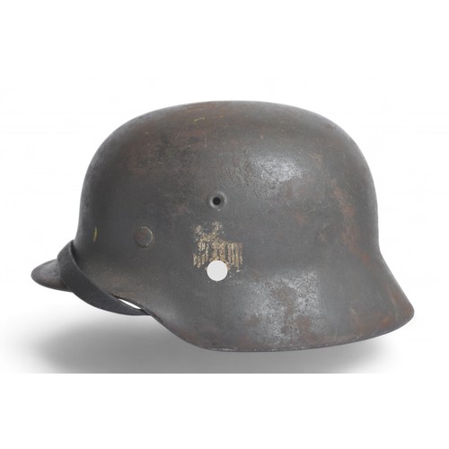 171 - WW2 German M40 Single Decal Army Helmet named 'Hormann'. An M40 single decal army combat helmet comp... 