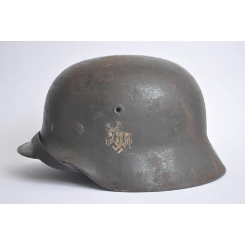 171 - WW2 German M40 Single Decal Army Helmet named 'Hormann'. An M40 single decal army combat helmet comp... 