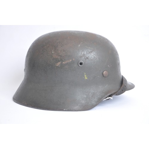 171 - WW2 German M40 Single Decal Army Helmet named 'Hormann'. An M40 single decal army combat helmet comp... 