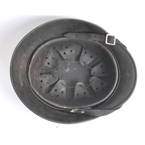 171 - WW2 German M40 Single Decal Army Helmet named 'Hormann'. An M40 single decal army combat helmet comp... 