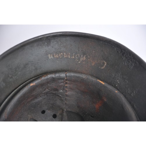 171 - WW2 German M40 Single Decal Army Helmet named 'Hormann'. An M40 single decal army combat helmet comp... 