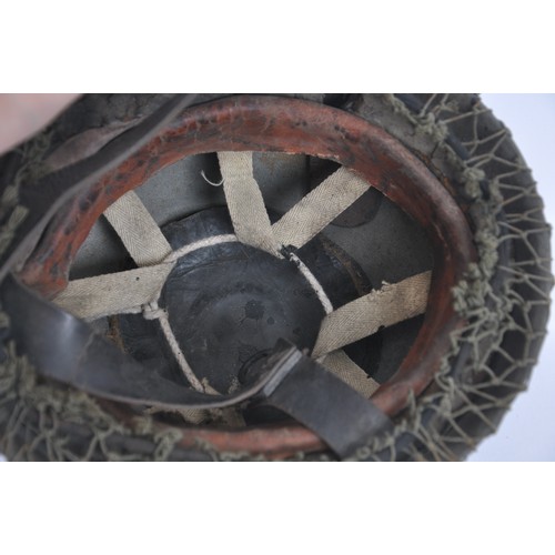 132 - WW2 British Fibre Rim Paratrooper Helmet With camouflage Net & 1942 Date. Rare example of the ea... 