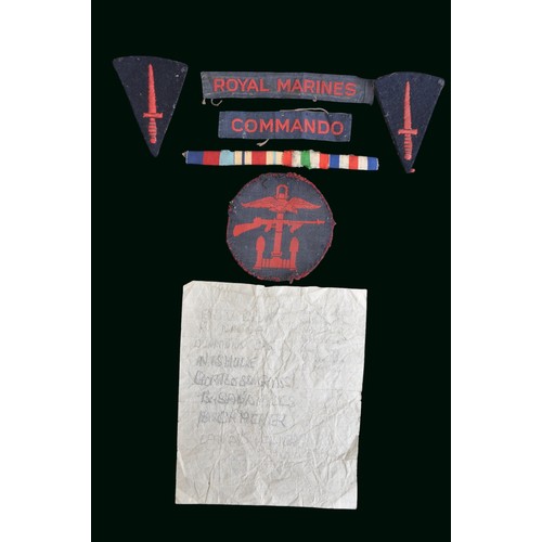 134 - WW2 Royal Marines Battledress Insignia. A small insignia group which appears to have been removed fr... 