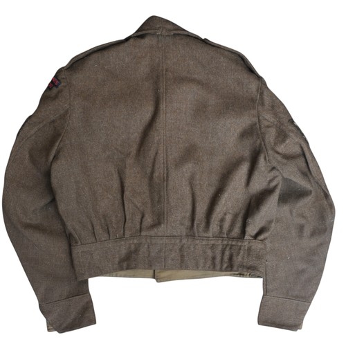 133 - A named WW2 Royal Marines Commando Battledress Dated 1942. Untouched battledress with 'ROYAL MARINES... 