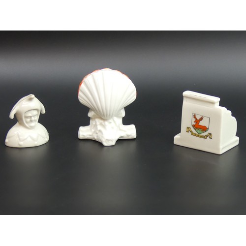 4 - Three items of crested china, viz. A National cash register Stevenage, Gt. Yarmouth Jester and a bla... 