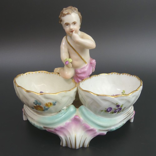 6 - Dresden figural porcelain table salt, circa 1890. 13cm high.