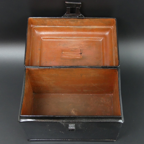 38 - Victorian hinged black tin box. 18.5cm wide x 19cm high.