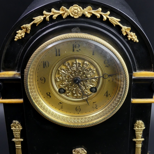 107 - Victorian marble and slate mantle clock with gilt metal embellishments and a French movement. 35cm h... 