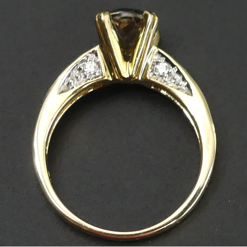 150 - 18ct gold citrine and diamond ring. Size 'N'. 7.3mm wide. 5 grams.