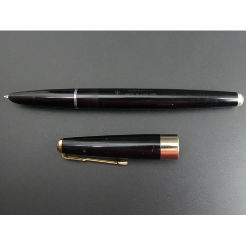 153 - Parker no. 17 black and rolled gold fountain pen. 135mm long.