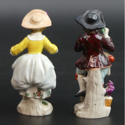 174 - A pair of early 20th century Sitzendorf porcelain figures of Gardeners. 115mm high.