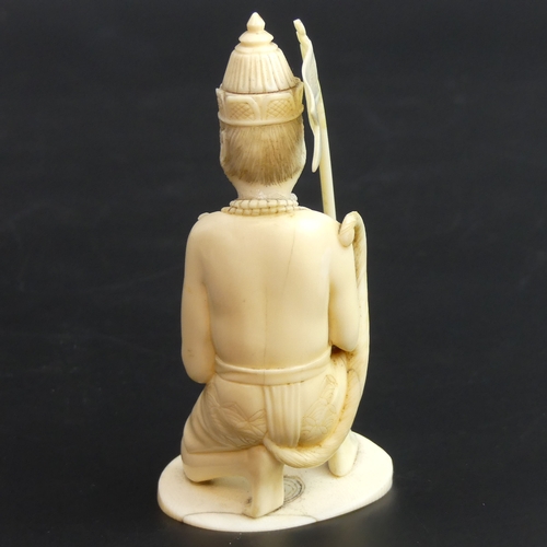 177 - Finely carved Indian ivory anthropomorphic figure of a monkey warrior, circa 1900. 115mm tall.