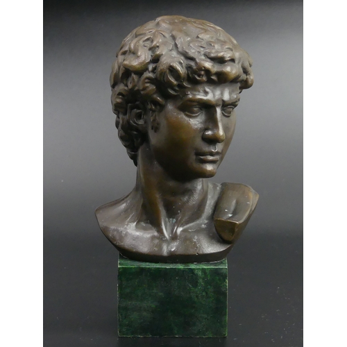 23 - A bronze bust of David on a marbled base. 17.5cm high.
UK Postage £15.