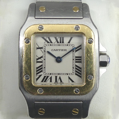 26 - Ladies 18ct and Stainless Steel Cartier Santos quartz watch, with the original box and papers.
Watch... 