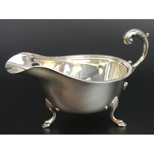 36 - George V silver sauce boat, Birmingham 1932. 90 grams. 16cm long x 8.7cm high.
UK Postage £15.