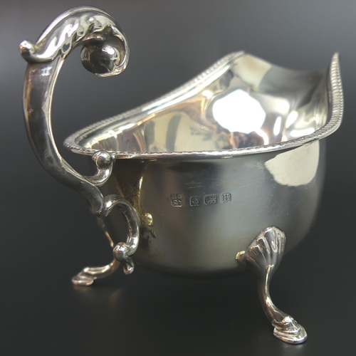 36 - George V silver sauce boat, Birmingham 1932. 90 grams. 16cm long x 8.7cm high.
UK Postage £15.