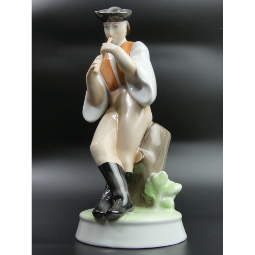 42 - Zsolnay Pecs Hungary porcelain figure of a man playing a flute. 26.5cm high.
UK Postage £15.