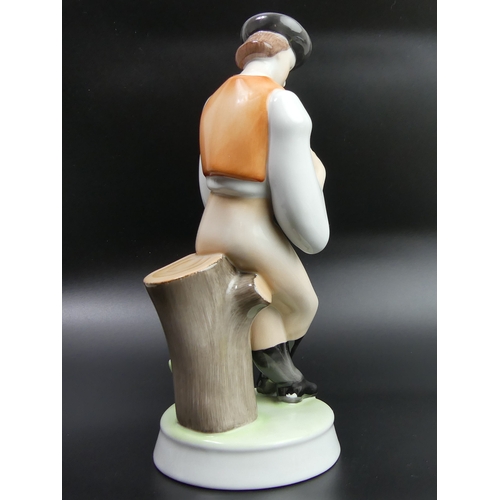 42 - Zsolnay Pecs Hungary porcelain figure of a man playing a flute. 26.5cm high.
UK Postage £15.