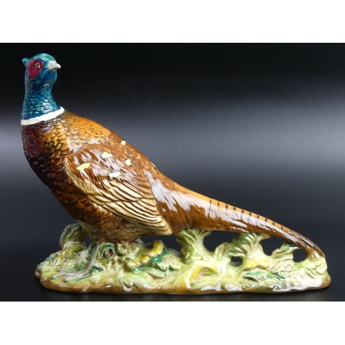 46 - Beswick pottery figure of a Pheasant no.1225. 19.5cm high x 24cm long.
UK Postage £15.