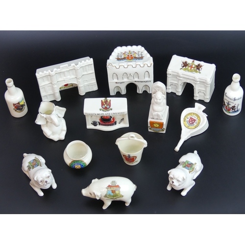 52 - 14 items of novelty crested china ware. Tallest 10cm.
UK Postage £15.