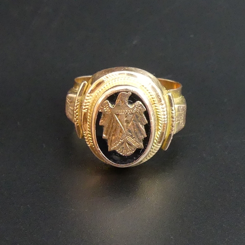 86 - A high carat gold signet ring, size X. 8.2 grams. Top 20.7 mm wide, the band 5.7 mm.
UK Postage £10