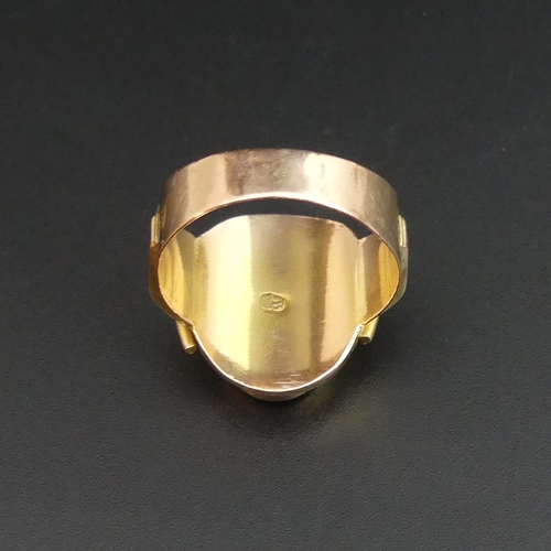 86 - A high carat gold signet ring, size X. 8.2 grams. Top 20.7 mm wide, the band 5.7 mm.
UK Postage £10