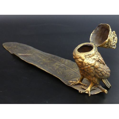 87 - A large bronze Owl and Feather design inkwell. 34 cm long x 13.5 cm high.
UK Postage £20.