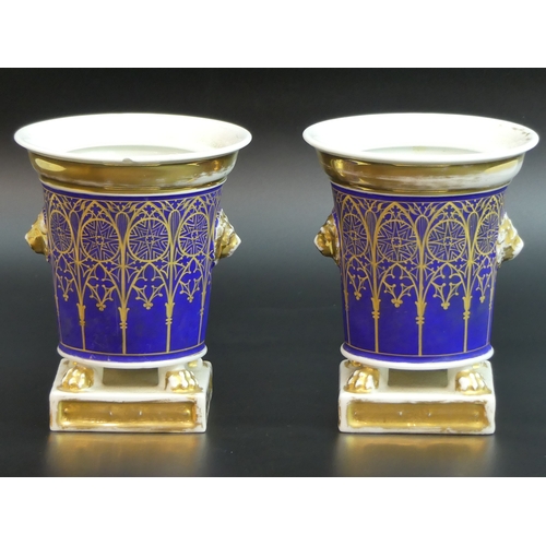 88 - A pair of Paris hand painted porcelain vases, dating from circa 1830. 14 cm high.
UK Postage £15.