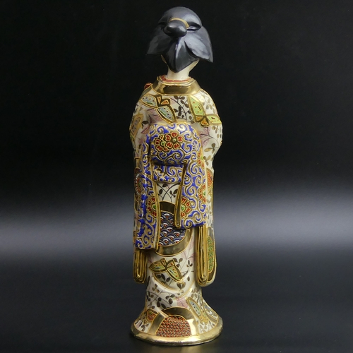 95 - An early 20th century Satsuma pottery Japanese Geisha girl figure. 31.5 cm tall.
UK Postage £15.