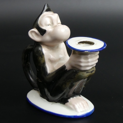 96 - An art deco monkey design porcelain candlestick, German circa 1930. 13 cm high.
UK Postage £15.