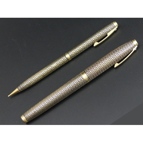 116 - A 14k GF Sheaffer ball point pen and propelling pencil. 13 cm long. UK Postage £12.