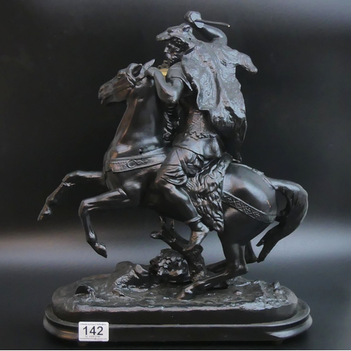 142 - A large painted black spelter figural clock. 43 cm high. UK Postage £30.