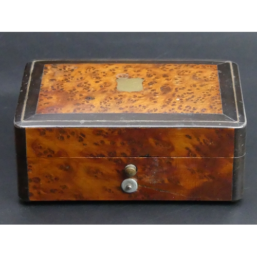 213 - Victorian Amboyna inlaid wooden, four air musical box. 13 x 8.5 5 cm. UK Postage £15.