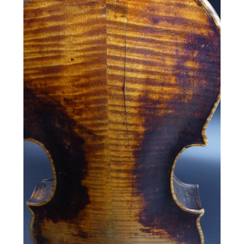 225 - A good old violin in playable un-touched condition, complete with hard case and bow. Length of back ... 