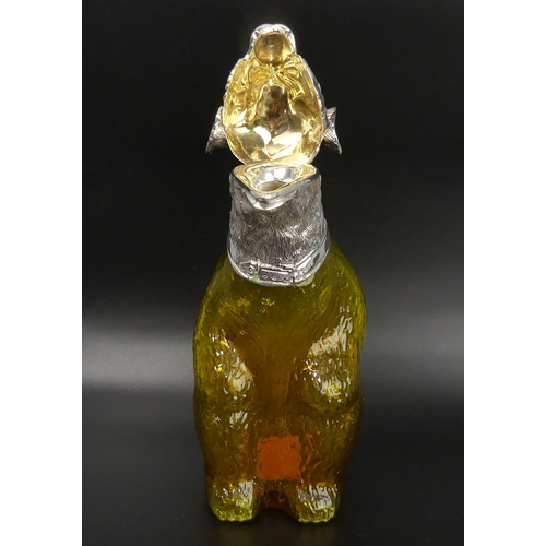 107 - Amber glass and silver plate bear design claret jug. 22.5 cm high. UK Postage £16.