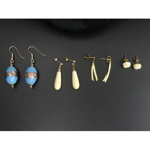 10 - Various gold earrings and a 9 carat gold chain. Largest earrings 4.5 cm, chain 46 cm. UK Postage £12... 