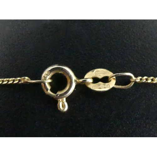8 - 14 carat gold diamond and multi-coloured stone set pendant and chain, along with a matching pair of ... 