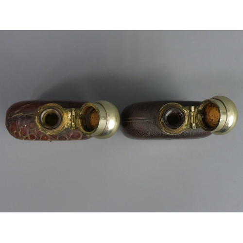 131 - Two Victorian glass, silver plate and leather hip flasks. 12 cm high. UK Postage £12.