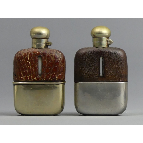 131 - Two Victorian glass, silver plate and leather hip flasks. 12 cm high. UK Postage £12.