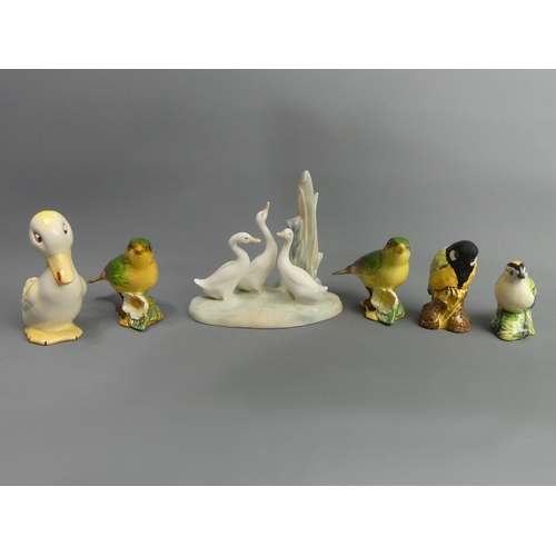 148 - Five Beswick birds and a Lladro Nao china duck group. Nao 12 cm. UK Postage £15.