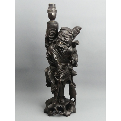 265 - Carved Japanese hardwood figural table lamp, circa 1920. 44 cm. UK Postage £18.